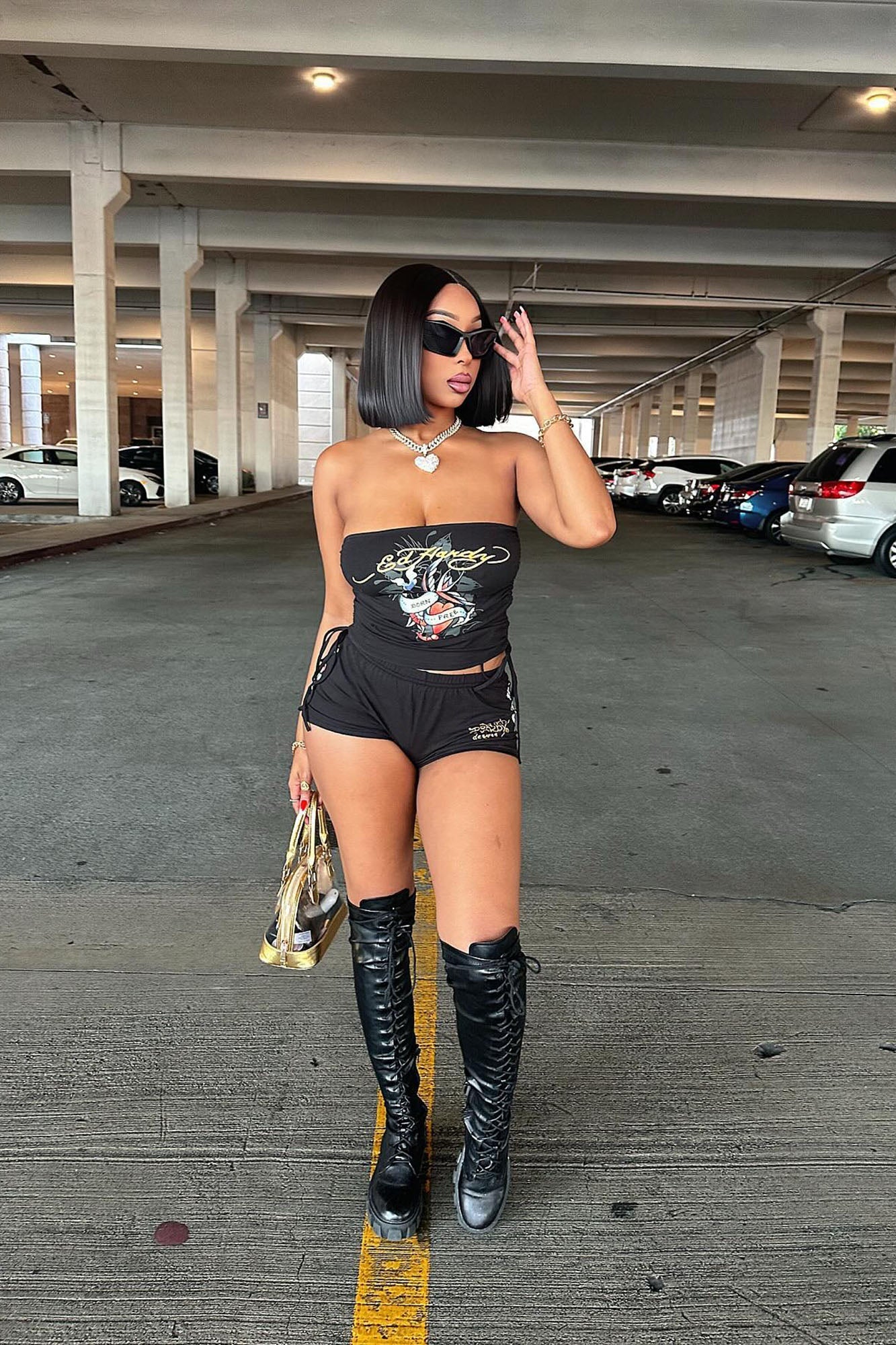 https://cdn.shopify.com/s/files/1/0293/9277/files/5-20-2024__024_Ed_Hardy_Bird_And_Hearts_Tube_Top_Black_GF.jpg?v=1717022118